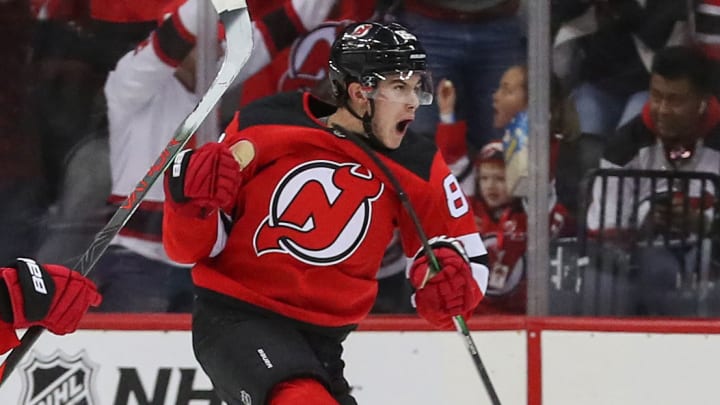 Devils' Jack Hughes Scores First NHL Goal in Win Over Canucks Devils' Jack Hughes Scores First NHL Goal in Win Over Canucks
