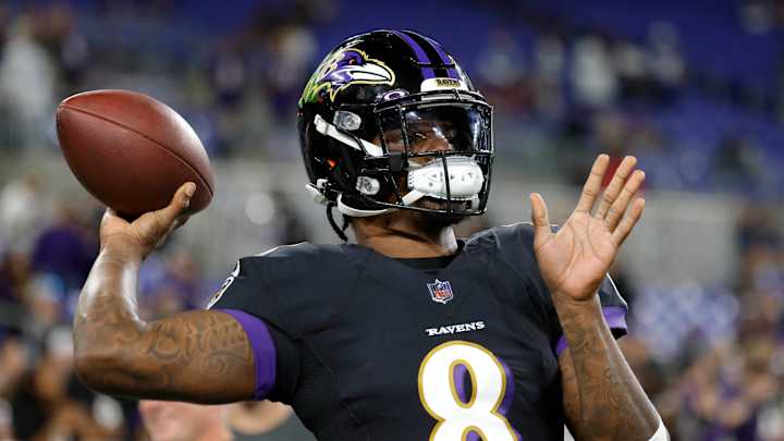 Louisville Surprises Lamar Jackson With News of Jersey Retirement Louisville Surprises Lamar Jackson With News of Jersey Retirement