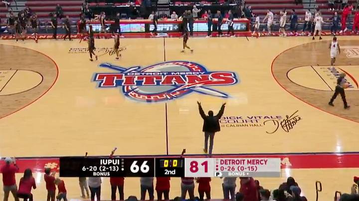 Lone Fan Storms Court After College Basketball Team's First Win of the Season