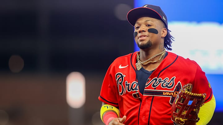 Multiple Fans Rush Field and Make Contact With Braves’ Ronald Acuña