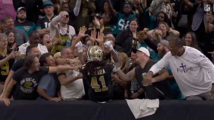 Alvin Kamara Jumped All the Way Into the Stands After Scoring Game-Tying Two-Point Conversion Alvin Kamara Jumped All the Way Into the Stands After Scoring Game-Tying Two-Point Conversion